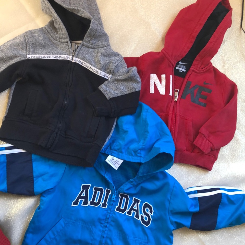 (3)12 month zip up sweater